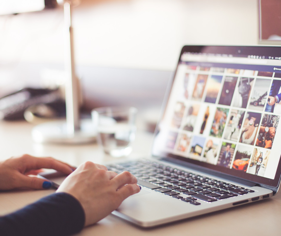 web designer typing on keyboard